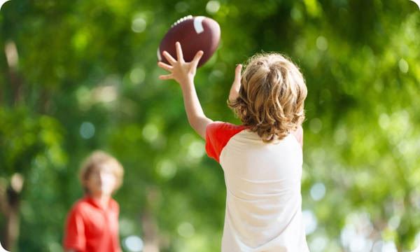 Family Playing Football