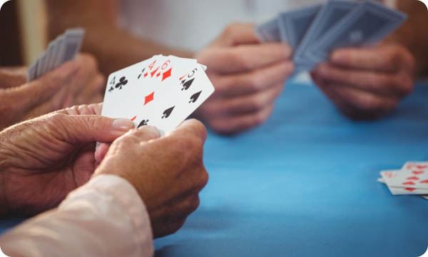 Retired People Playing Cards