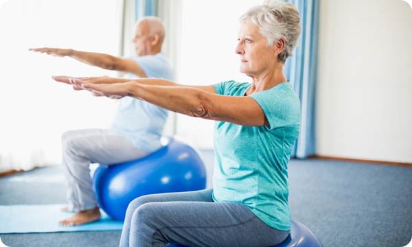 Seniors Using Exercise Ball