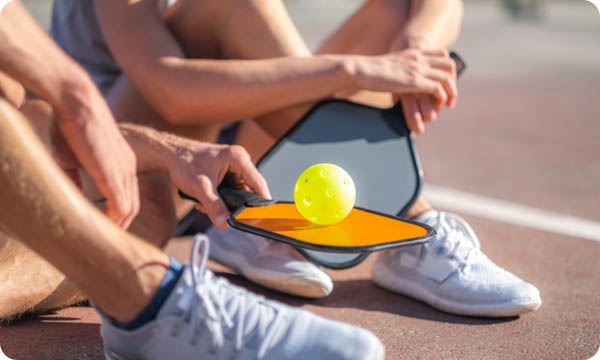 Relaxing Pickleball Players Couple