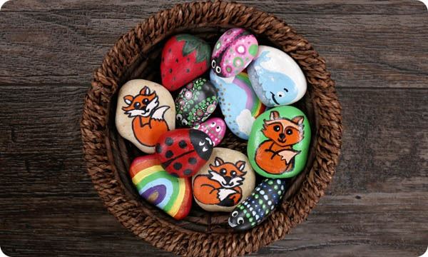 Collection of Hand Painted Colorful Rocks in Wicker Basket